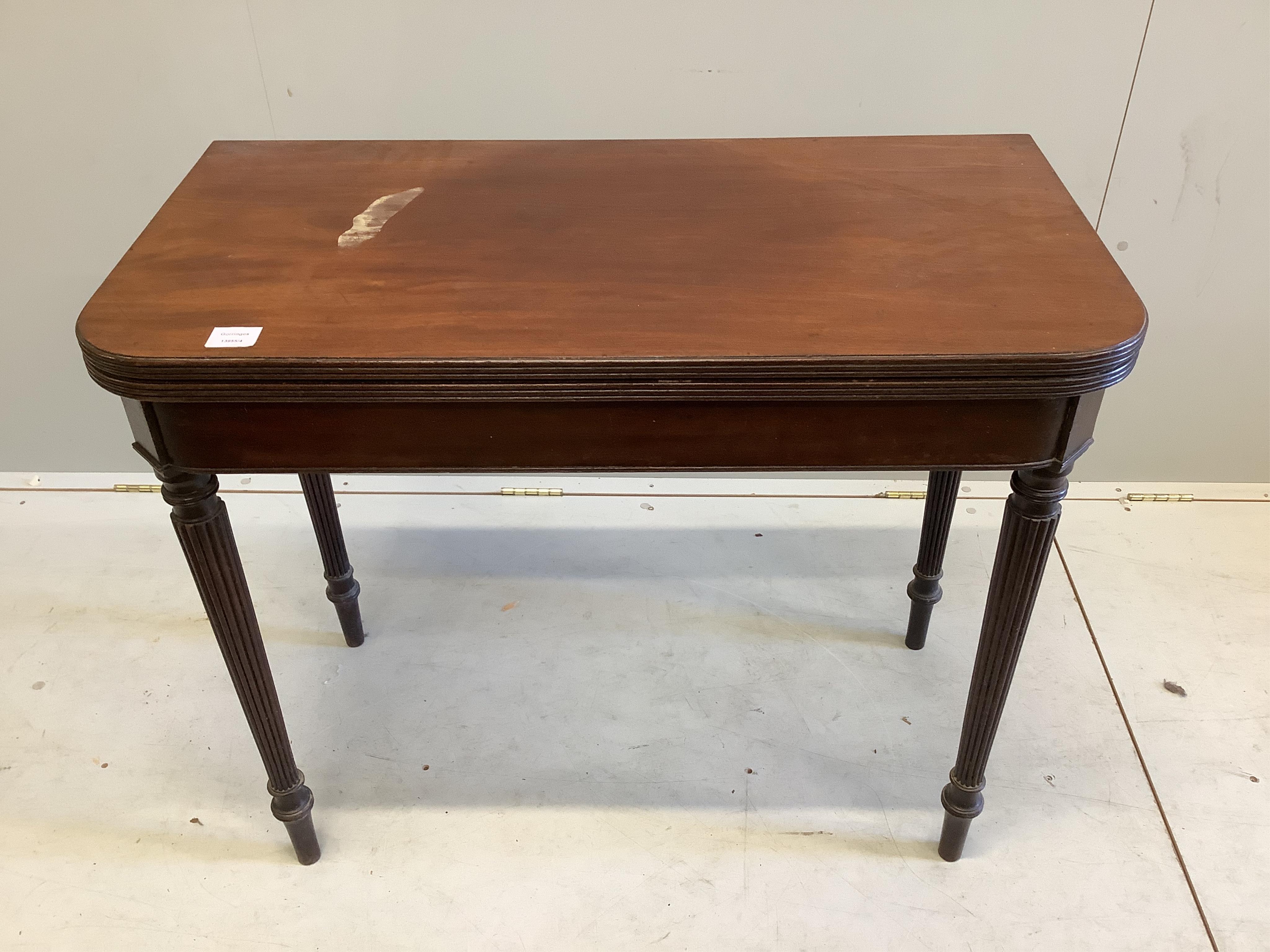 A Regency mahogany folding card table, width 92cm, depth 46cm, height 76cm. Condition - fair